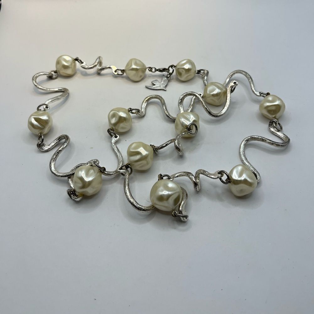 Cecile Jeanne Paris, Faux pearls and silver tone necklace.